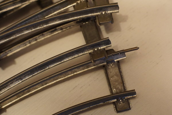 Konvolut 10 mal gebogene Schiene für 8er Kreis Spur 0 Uhrwerk, Hersteller unbekannt